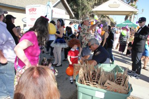 Chief Escalante dispensing safety tips and goodies to 'Annie'